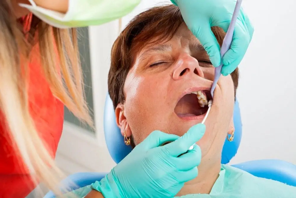 Patient undergoing restorative dental treatment at Sher Dental