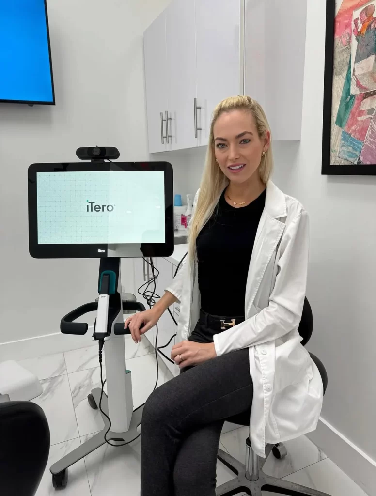 Sher Dental clinician using an iTero digital intraoral scanner