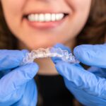 Invisalign aligners as part of an oral hygiene routine in North Miami